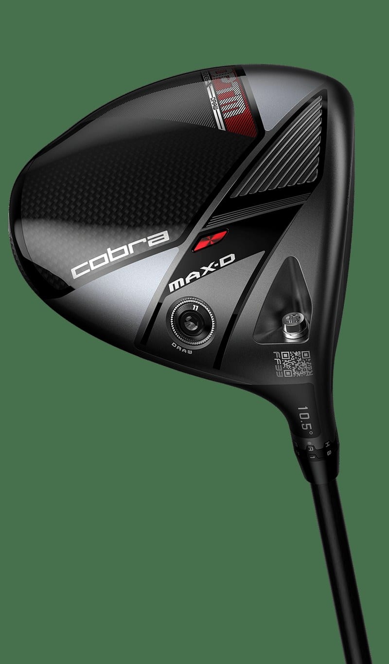 The sole of a Cobra OPTM MAX-D driver, showing the cobra wordmark, a MAX-D badge, a weight port stamped 11 with DRAW printed underneath it, a smaller fastener to its right, an FF33 QR code beside the hosel, and a 10.5 degree loft stamp.