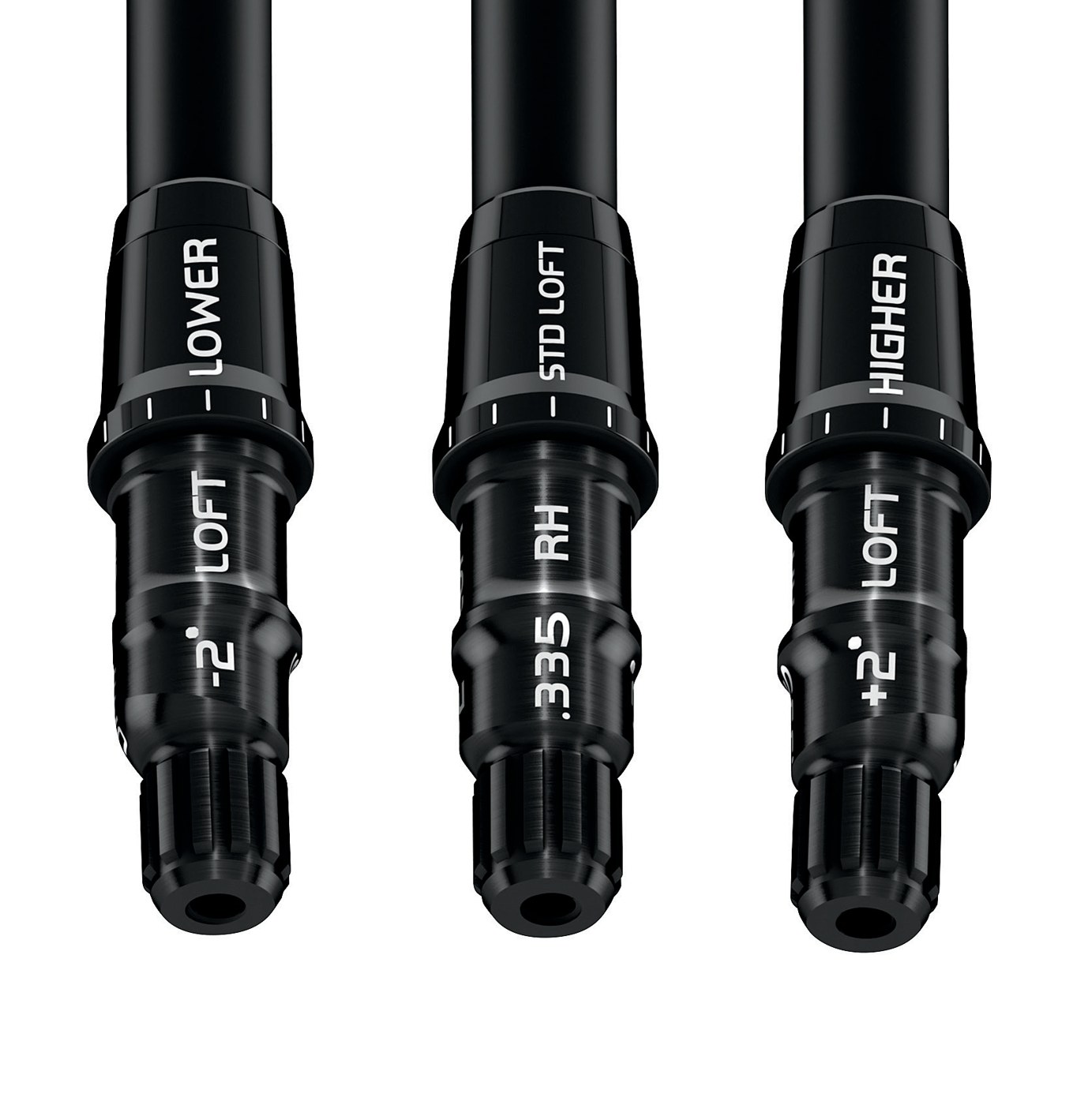 Three TaylorMade loft sleeves side by side, marked LOWER with minus 2 degrees of loft, STD LOFT, and HIGHER with plus 2 degrees of loft.