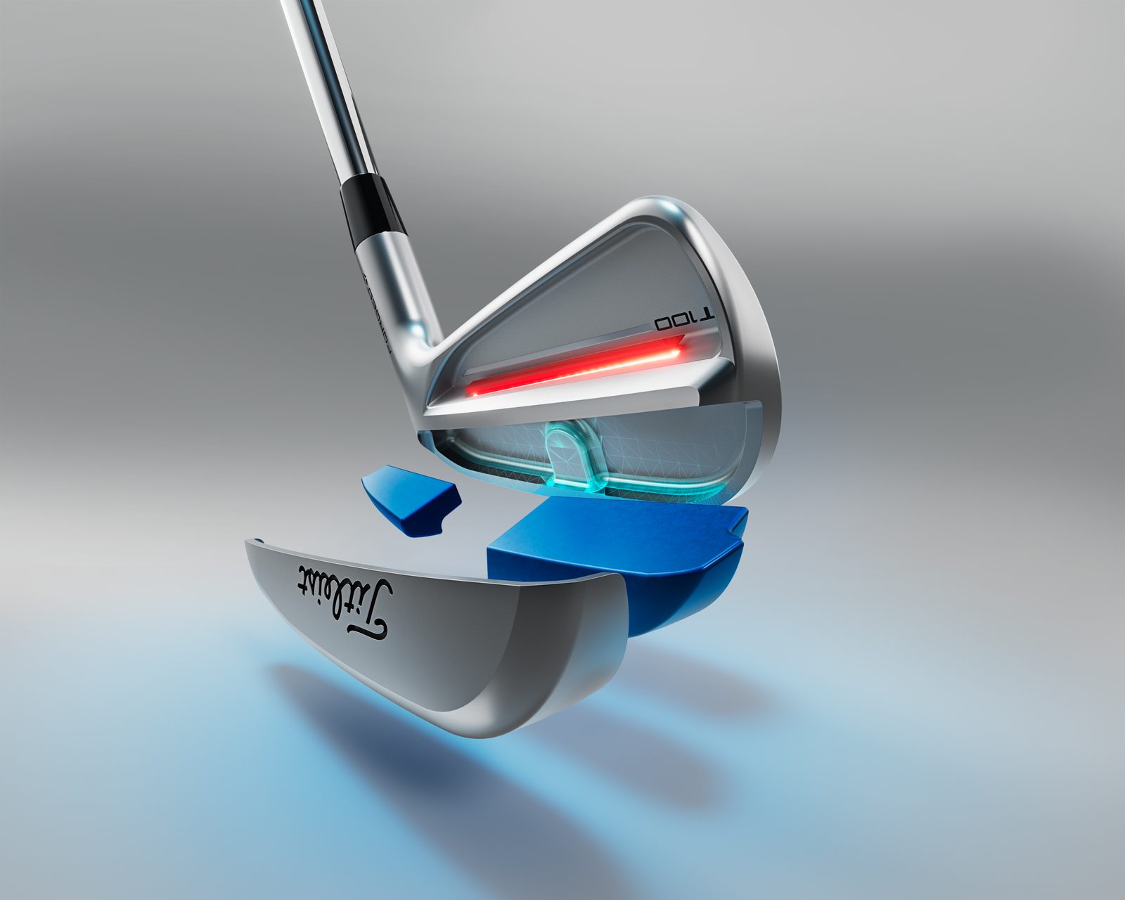 Cutaway view of the 2025 Titleist T100 showing internal tungsten weighting and the dual cavity structure.